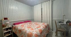 Casa de madeira à venda no bairro Praia Redonda, em Tubarão/SC